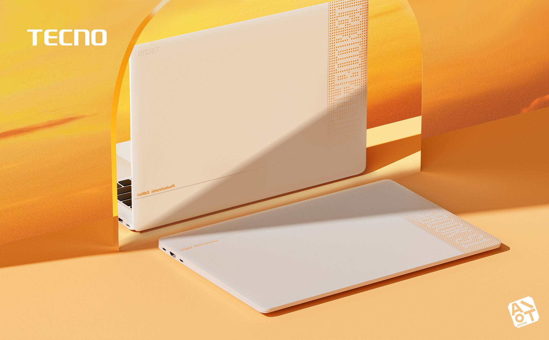 Product shot featuring one open and one closed white laptop