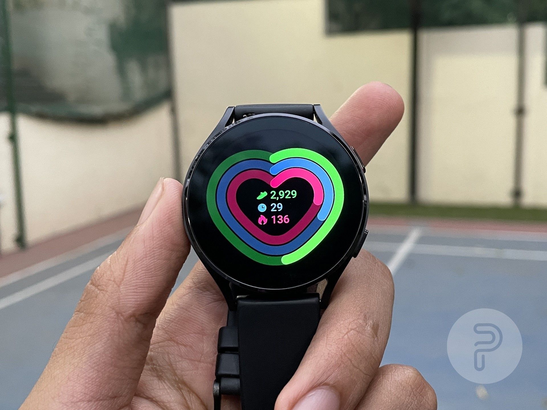 the screen of Galaxy Watch 4 showing fitness metrics